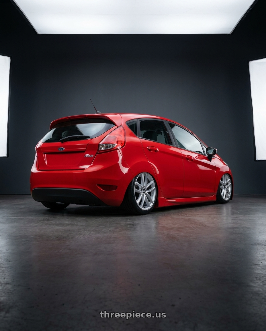 2010 Ford fiesta with BBS SX 5x112 17x7.5+45 Sport Silver wheels rear three quarter view slight stretch tires