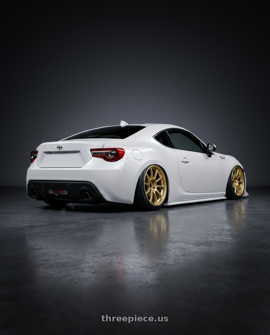 2016 Scion FR-S with Advan RCIII 5x100 18x7.5+48 Gold wheels rear three quarter view slight stretch tires