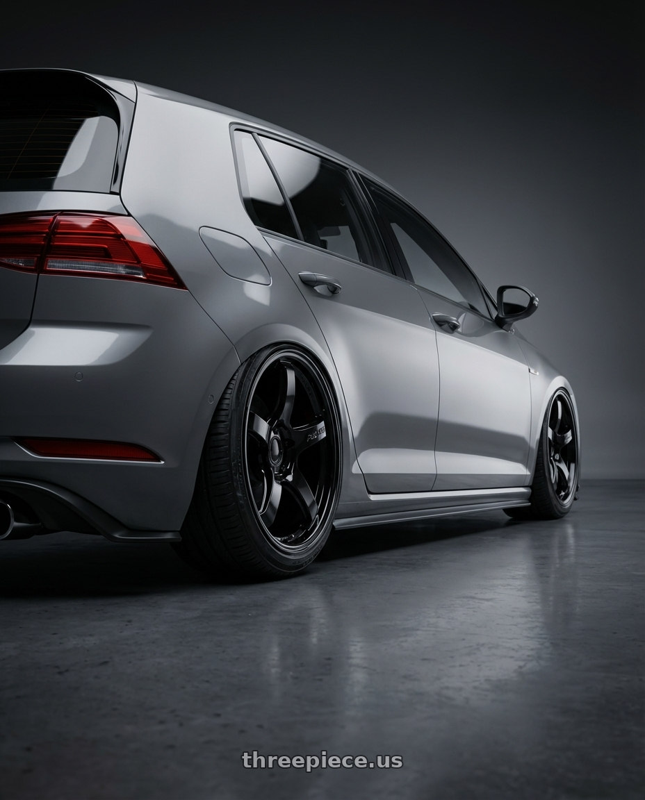 2019 Volkswagen GTI MK7 with Gram Lights 57CR 5x112 19x10.5+22 Glossy Black wheels rear three quarter view slight stretch tires