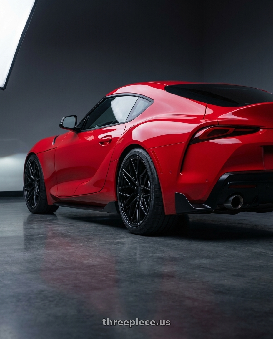 2023 Toyota GR Supra with Avant Garde Wheels M520R 5X112 19x9.5 +40 Gloss Black wheels rear three quarter view square tires