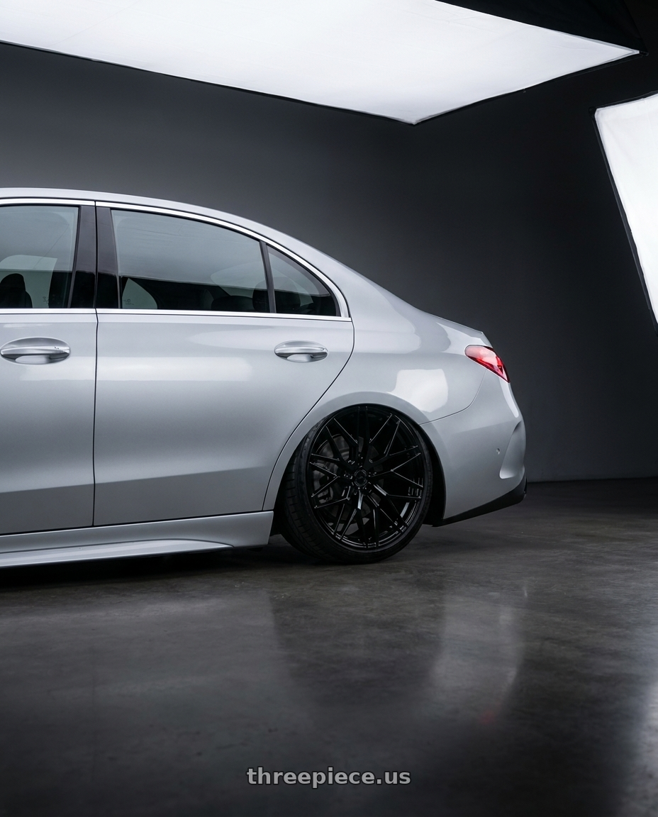 2022 Mercedes-Benz C-Class W206 with Avant Garde Wheels M520R 5X112 19x9.5 +40 Gloss Black wheels rear three quarter view slight stretch tires