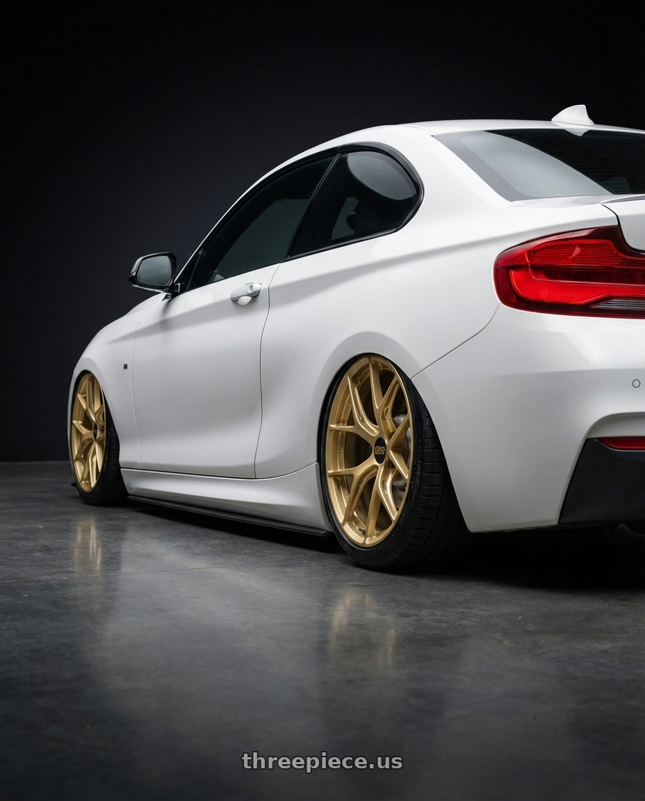 2018 BMW 2 Series F22 with BBS FI-R 5x120 19x10.5+35 Gold wheels rear three quarter view slight stretch tires