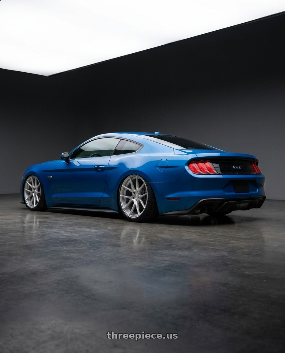 2022 Ford Mustang GT with Avant Garde Wheels M510 5X114.3 20x8.5 +20 Satin Silver wheels rear three quarter view slight stretch tires