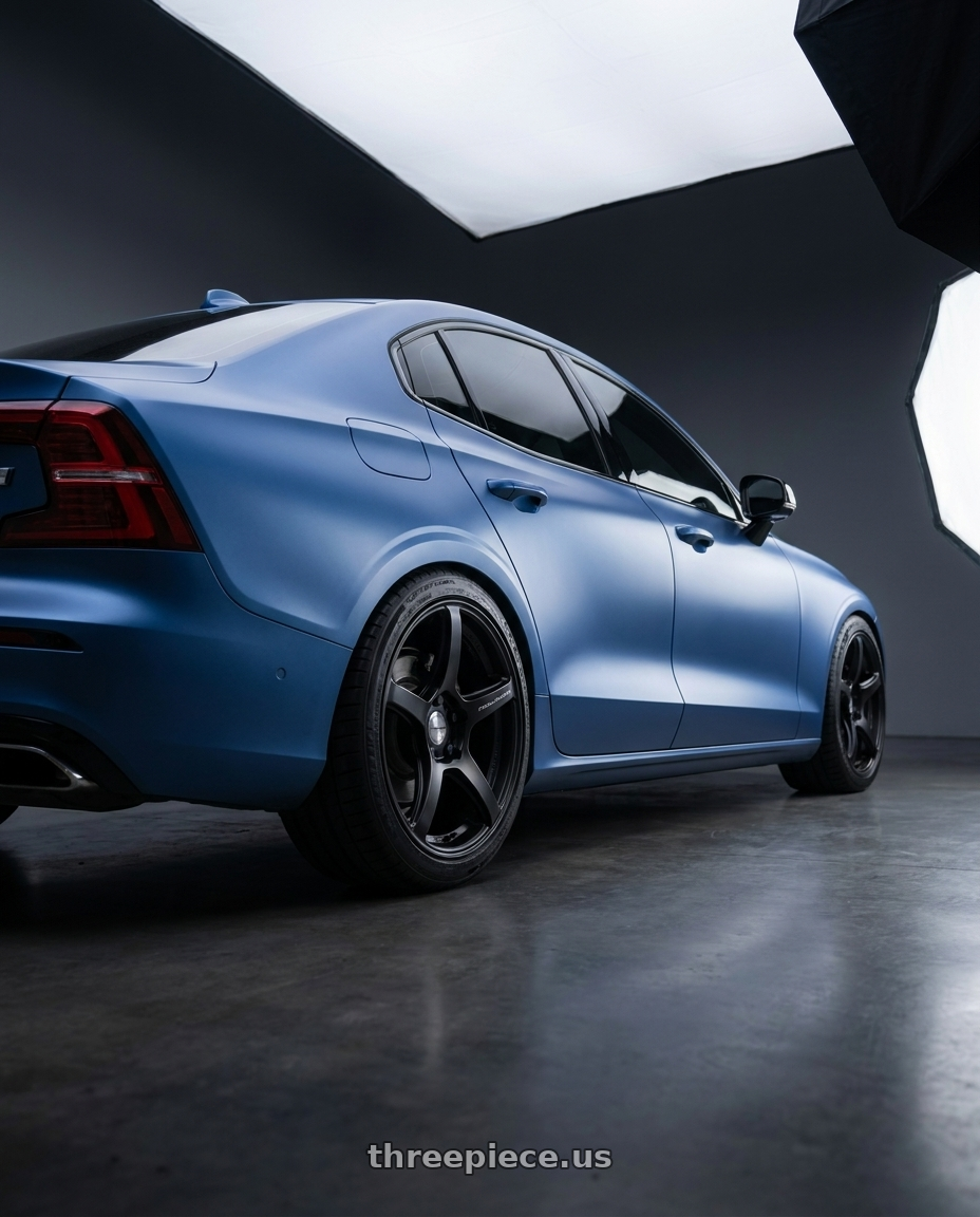 2020 Volvo S60 with Work Emotion T5R wheels rear three quarter view square tires