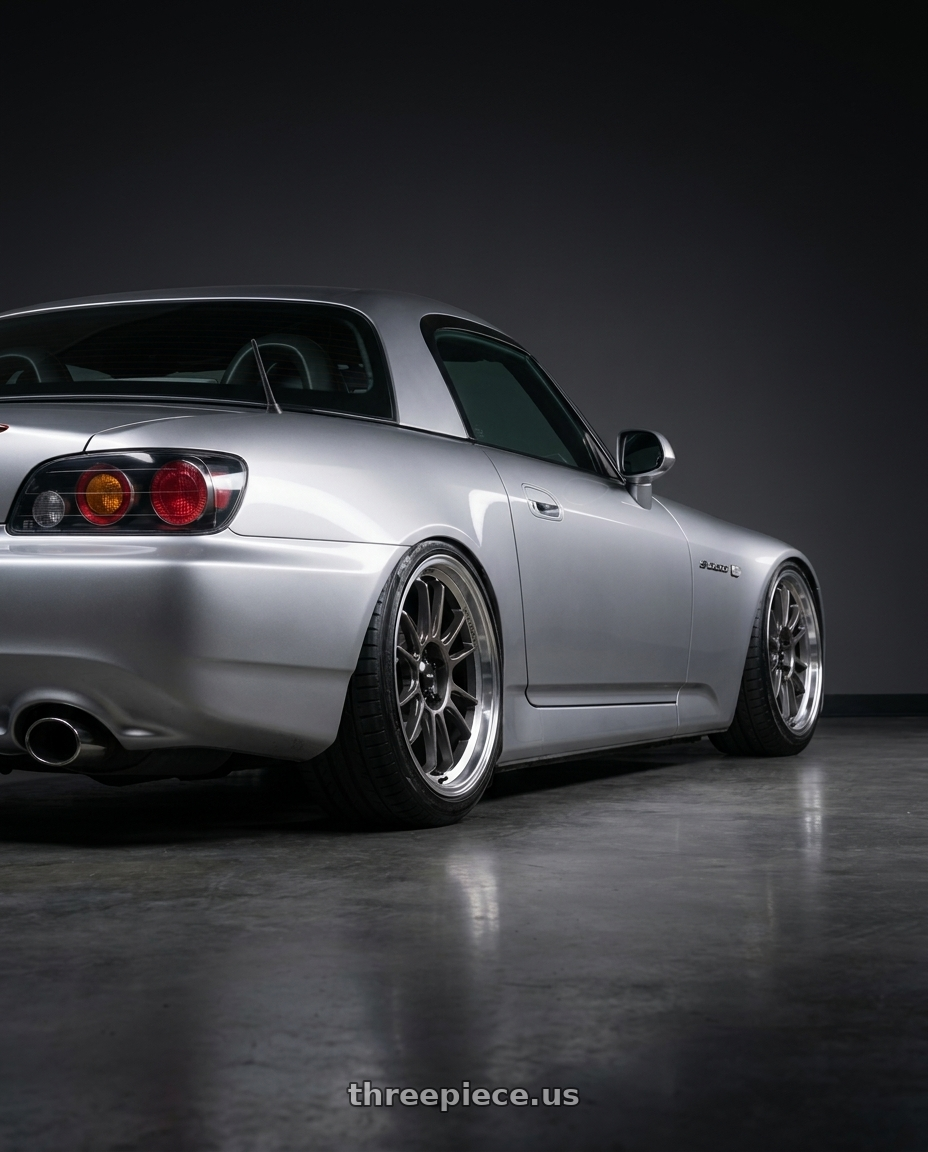 2006 Honda s2000 with Konig Hypergram 5x100 17x9+40 Metallic Carbon w/ Machined Lip wheels rear three quarter view slight stretch tires