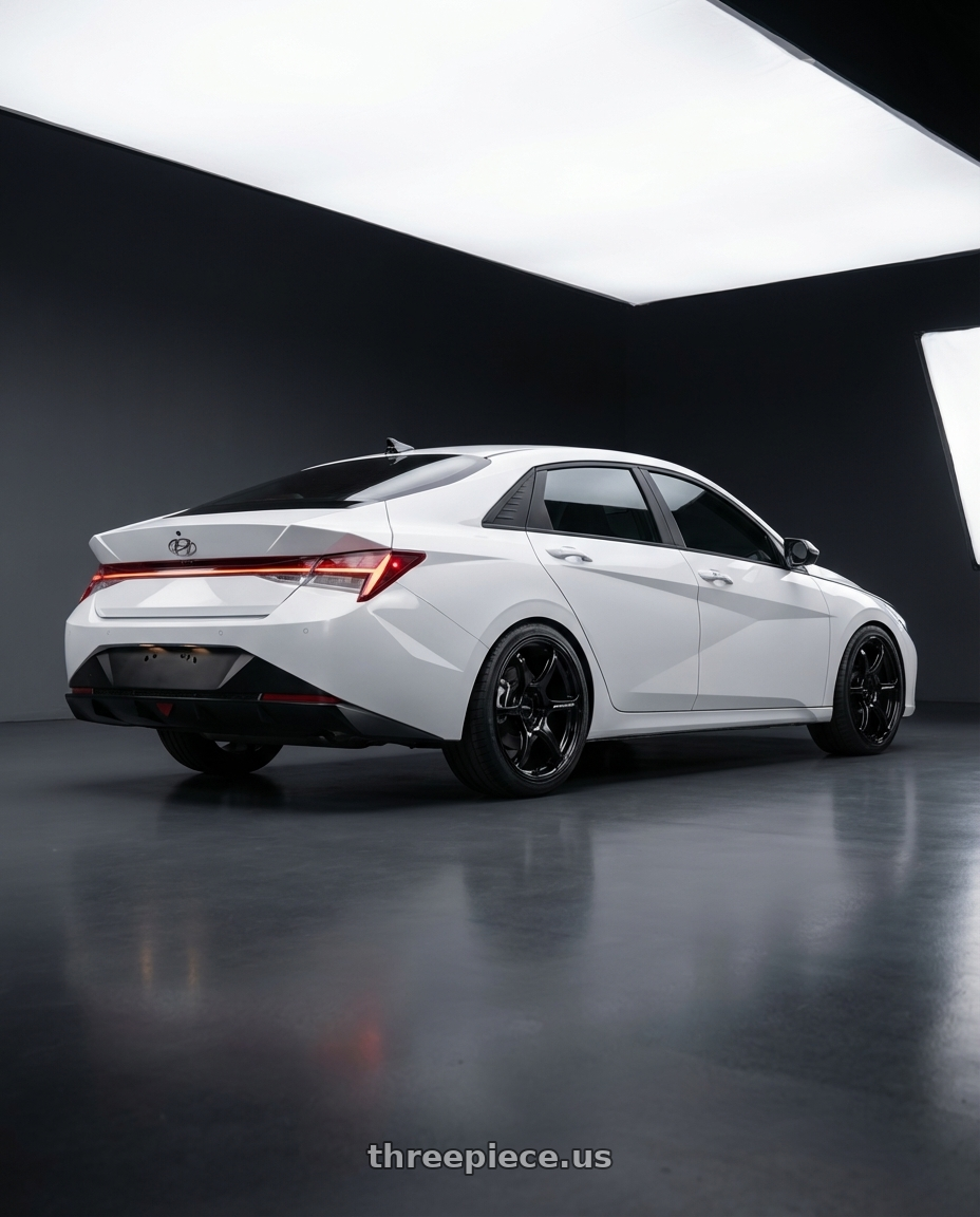 2024 Hyundai Elantra N with Advan RGIII 5x114.3 19x8.5+38 Gloss Black wheels rear three quarter view square tires