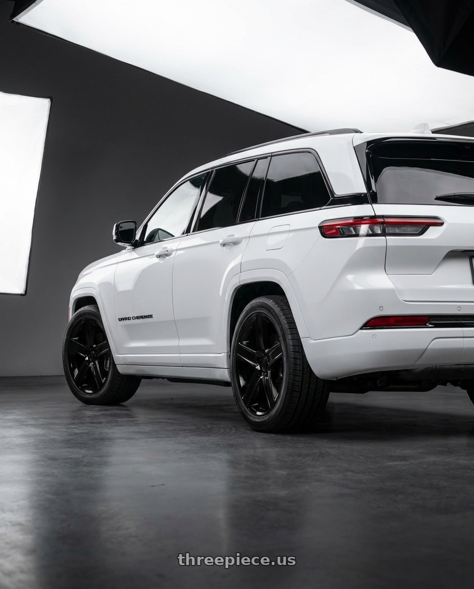 2023 Jeep Grand Cherokee with OE Wheels JP06 5x127 20x9+34.75 Black wheels rear three quarter view square tires