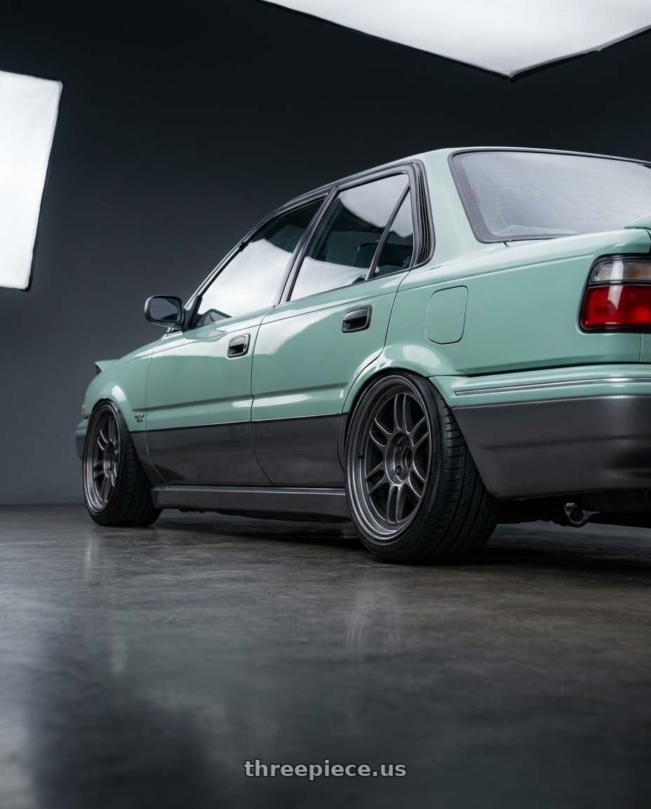 1990 TOYOTA COROLLA AE92 Truneo  with Enkei RPF1 4x100 15x8+28 Gunmetal wheels rear three quarter view square tires