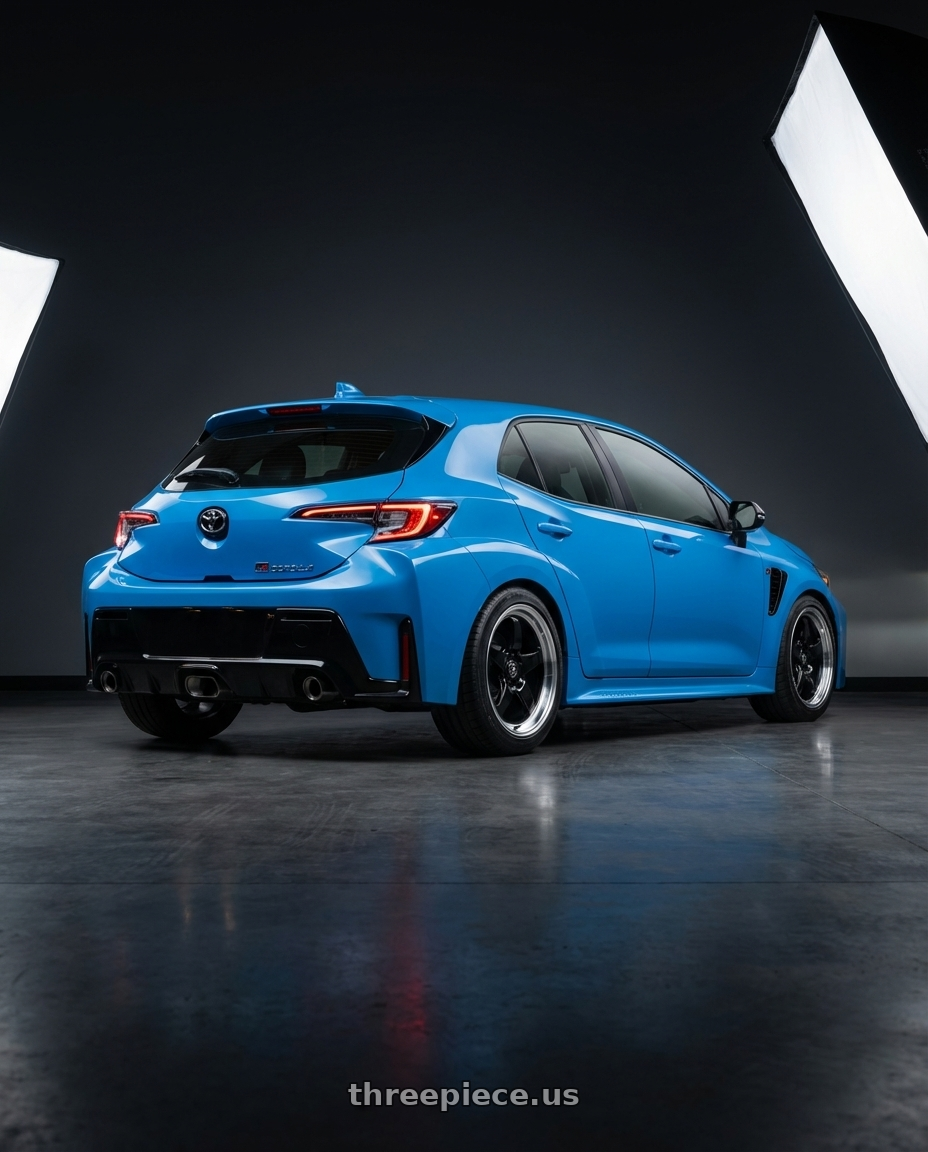 2024 Toyota GR Corolla with Forgestar D5 Drag 5x114.3 18x10 +22 Gloss Black Machined wheels rear three quarter view square tires