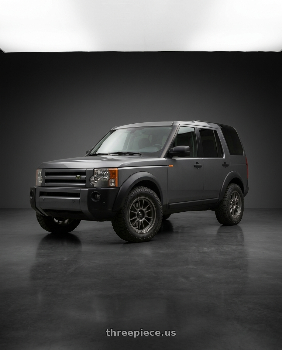 2004 Land Rover Discovery with Konig Hypergram 5x120 18x8.5+35 Matte Grey wheels front three quarter view stock stance