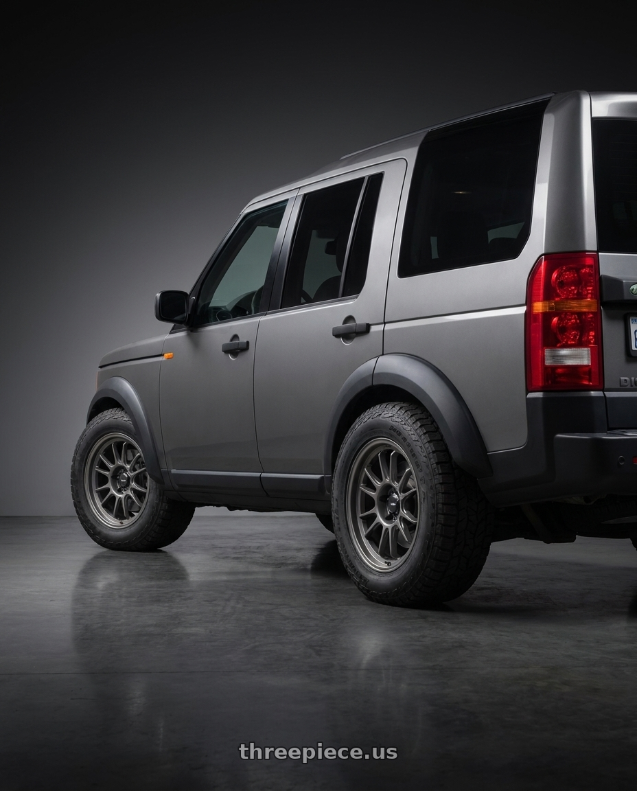 2004 Land Rover Discovery with Konig Hypergram 5x120 18x8.5+35 Matte Grey wheels rear three quarter view meaty tires