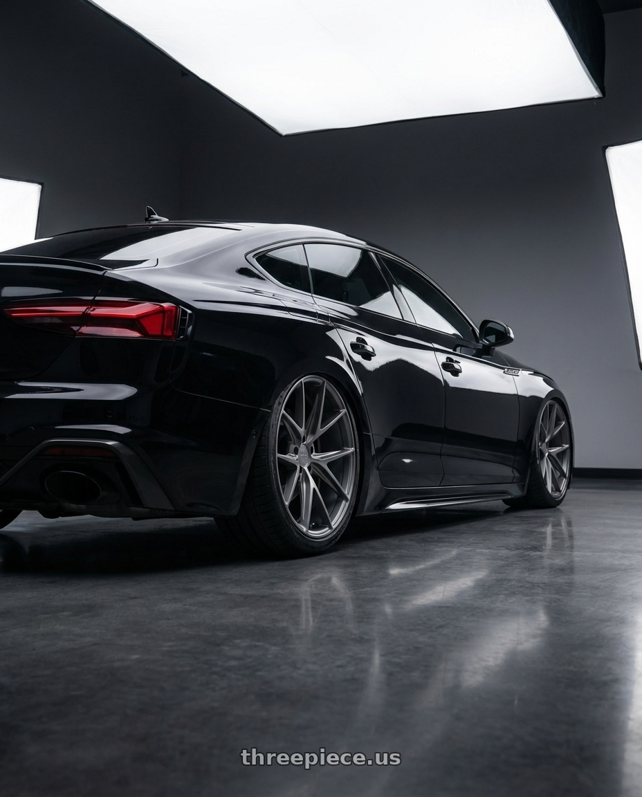 2022 Audi RS5 with Niche 1PC M116 MISANO 5X112 20X9 +27 MATTE GUN METAL wheels rear three quarter view slight stretch tires