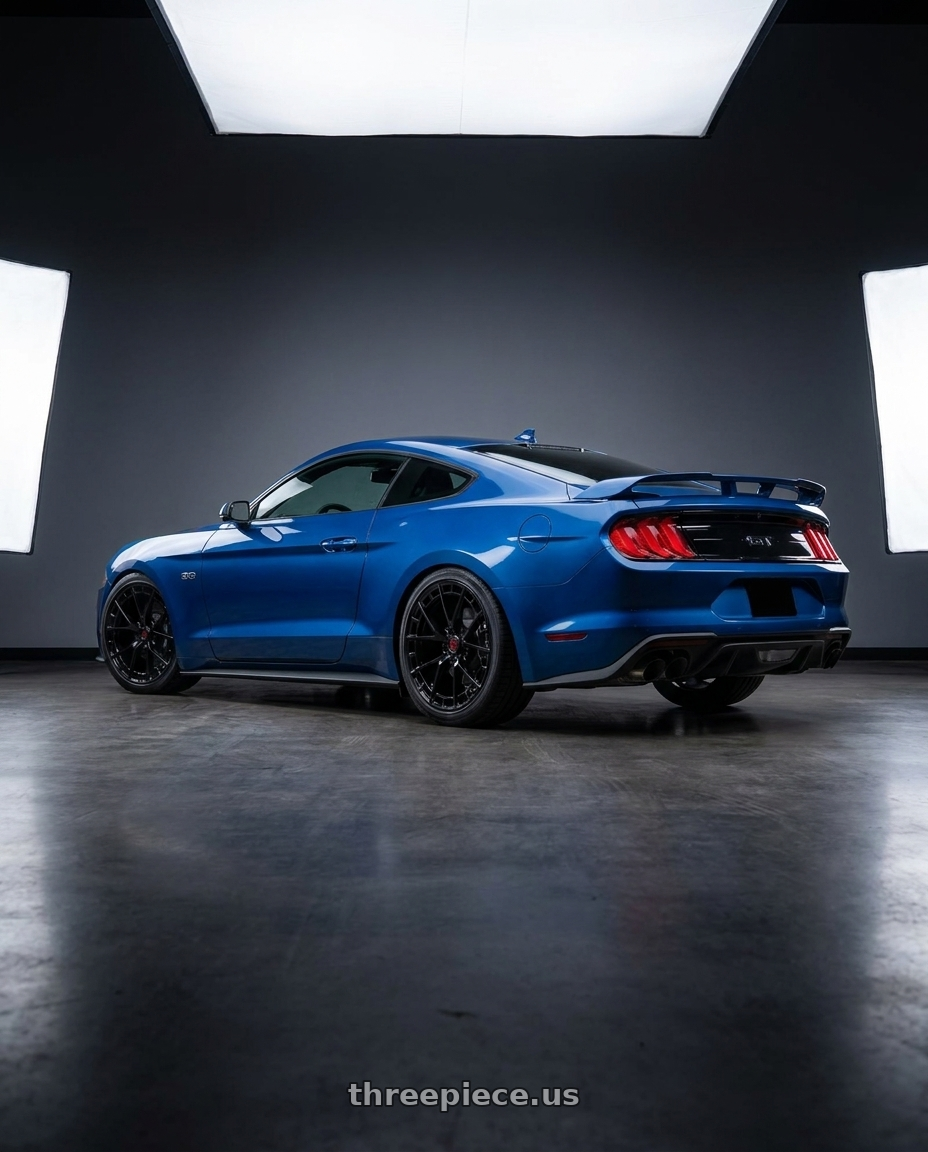2022 Ford Mustang GT with TIS Motorsports 504B 5X112 17x7.5 +35 Gloss Black wheels rear three quarter view square tires