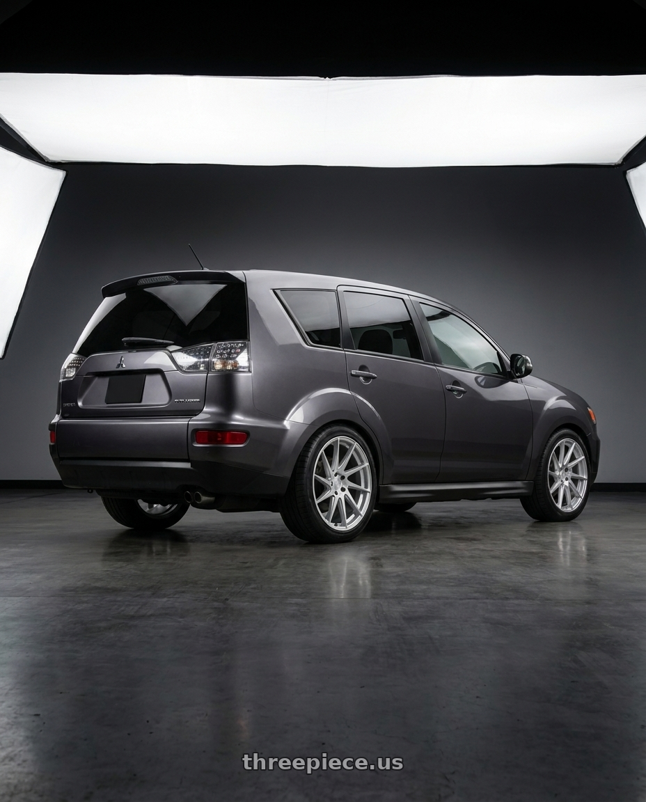 2011 Mitsubishi Outlander with Aodhan AH09 5x114.3 18x9.5 +35 Gloss Silver Machined Face wheels rear three quarter view square tires