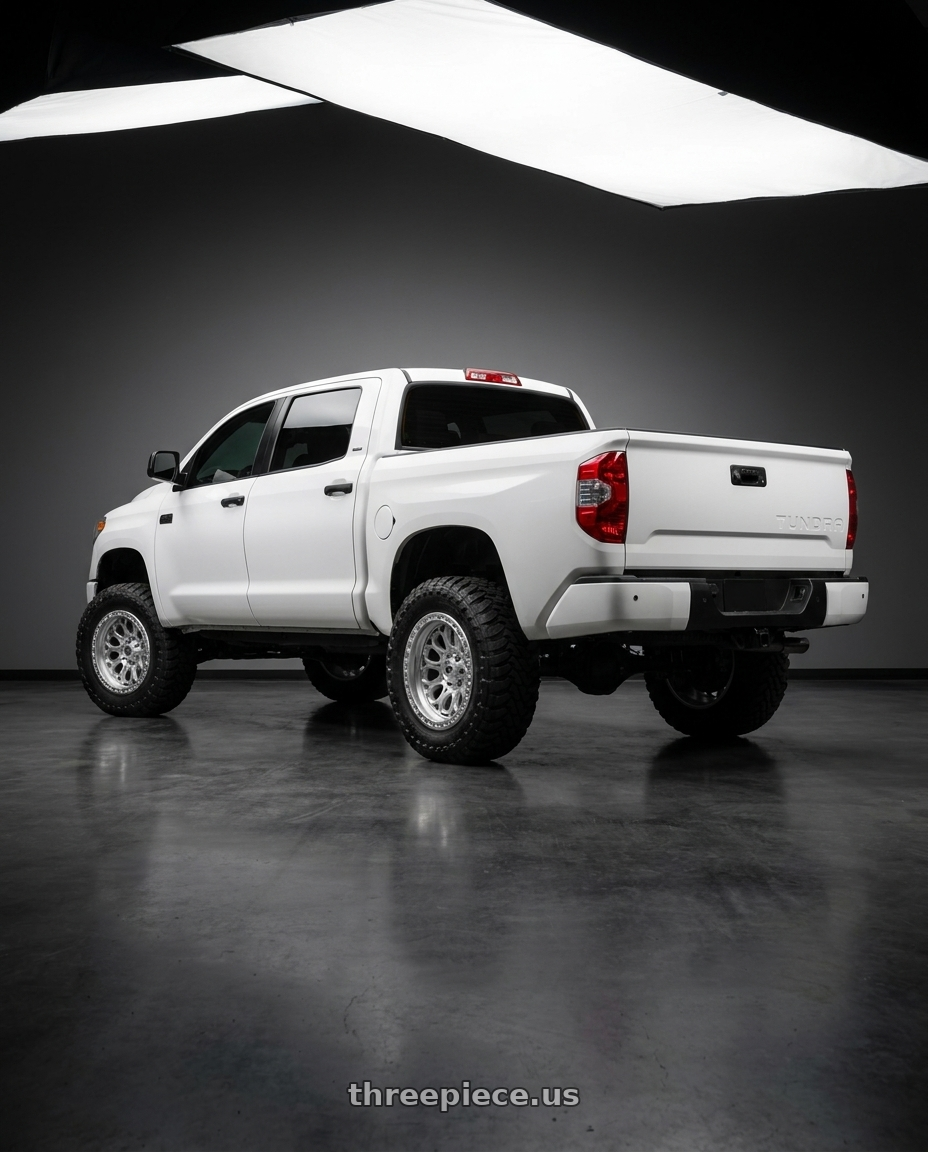 2016 toyota tundra platinum with Fittipaldi Offroad FT101MS 8x180 20x9 +18 Gloss Silver with Machined Face and Undercut wheels rear three quarter view meaty tires
