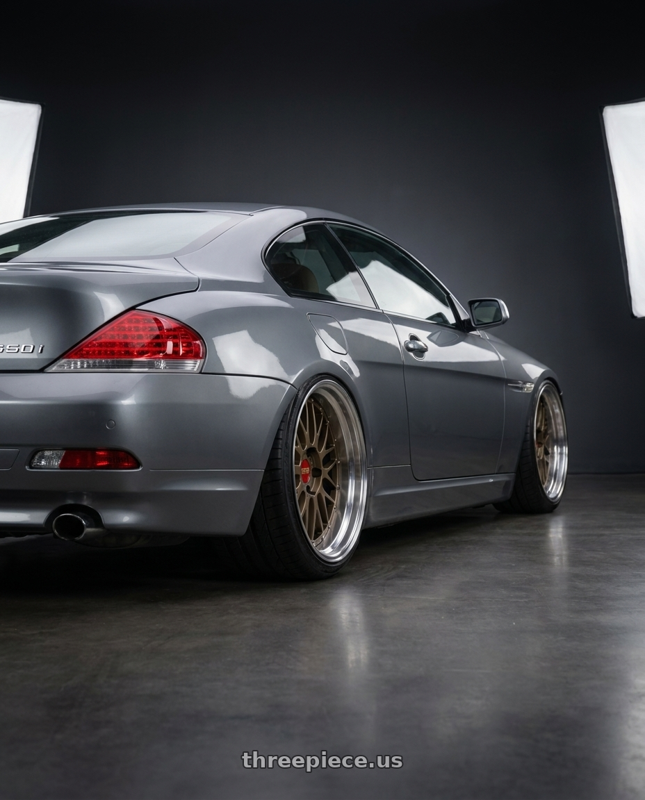 2006 BMW 650i with BBS LM 5x112 20x11.0+24 Matte Bronze wheels rear three quarter view extreme stretch tires