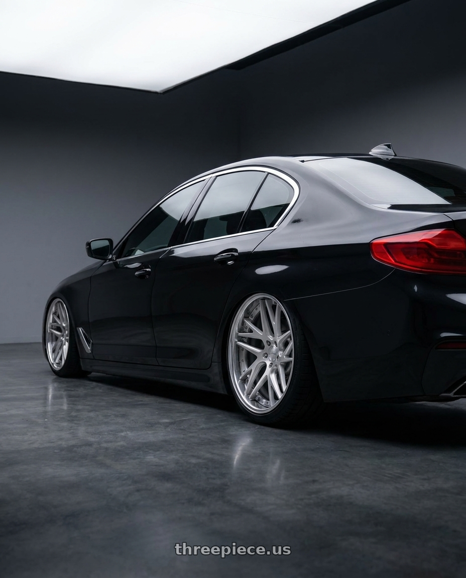 2017 bmw 540i base  with Work Gnosis Cvx 5x112 19x9.5+38 O Disk Brush Silver Clear wheels rear three quarter view square tires