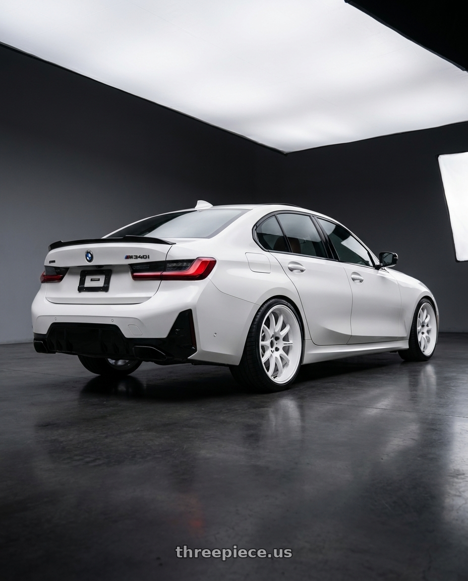 2025 BMW M340i xdrive with Work Emotion D9r 5x112 19x9.5 +38 White wheels rear three quarter view square tires