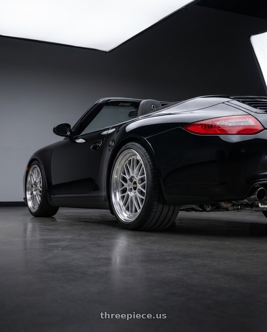 2012 Porsche 997 Cabriolet with BBS LM 5x130 18x11.0+56 Diamond Silver wheels rear three quarter view square tires
