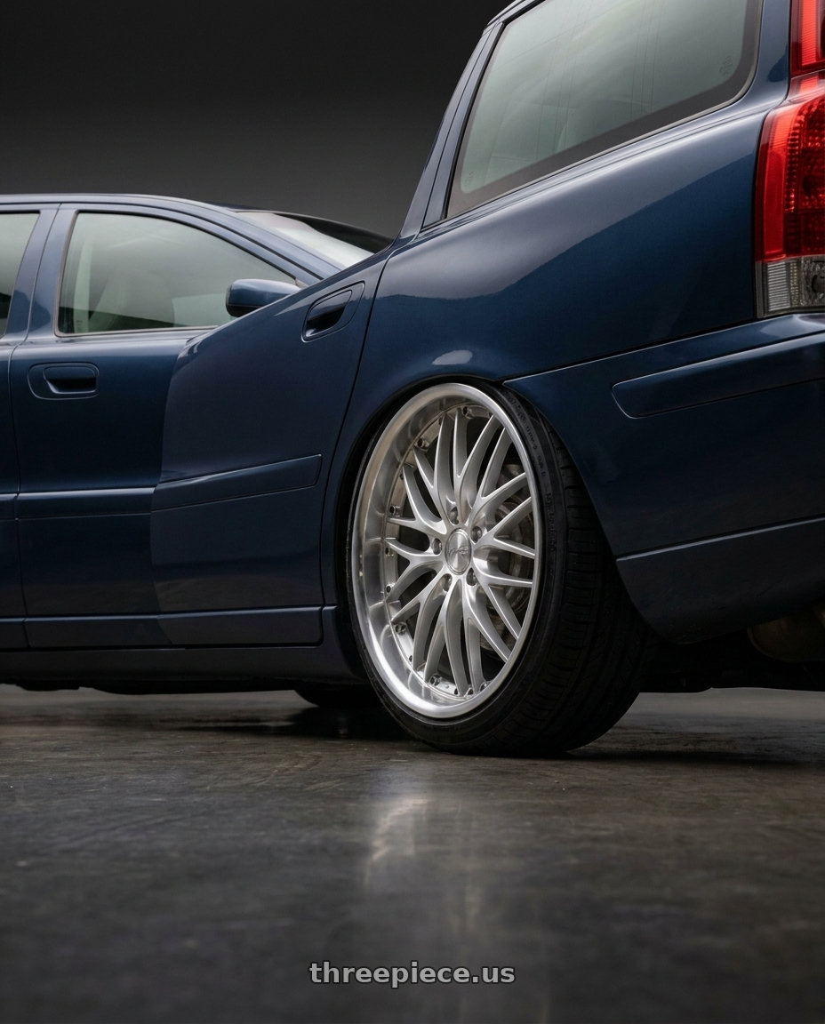 2007 Volvo V70 2.4 with MRR GT1 5x108 18x8.5  +35 Hyper Silver Machine Lip wheels rear three quarter view slight stretch tires