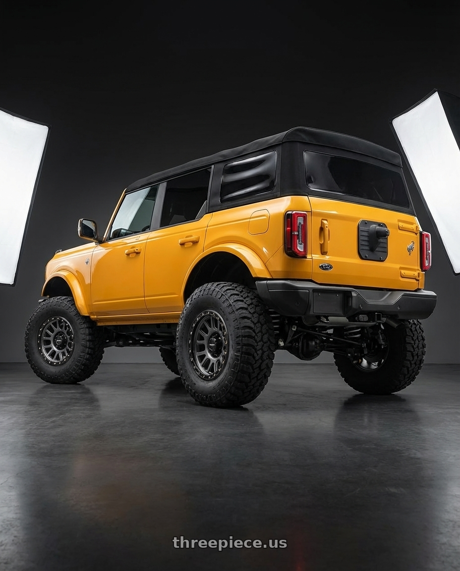 2024 Ford Bronco with Vision Off-Road 111 Nemesis 6x139.7 20x9+0 Gunmetal wheels rear three quarter view meaty tires