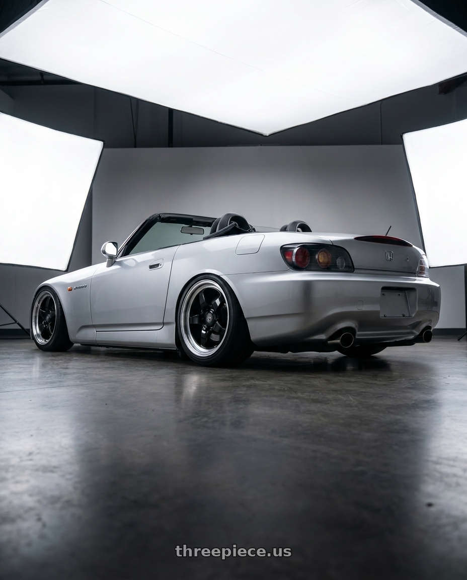 2009 Honda S2000 with Forgestar D5 Drag 5x114.3 17x10 +50 Gloss Black Machined wheels rear three quarter view slight stretch tires