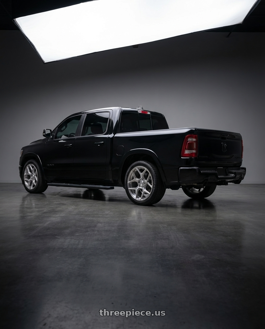 2022 ram 1500 with 4PLAY 4P06 6x135/6x139.7 22x9+12 Brushed wheels rear three quarter view square tires