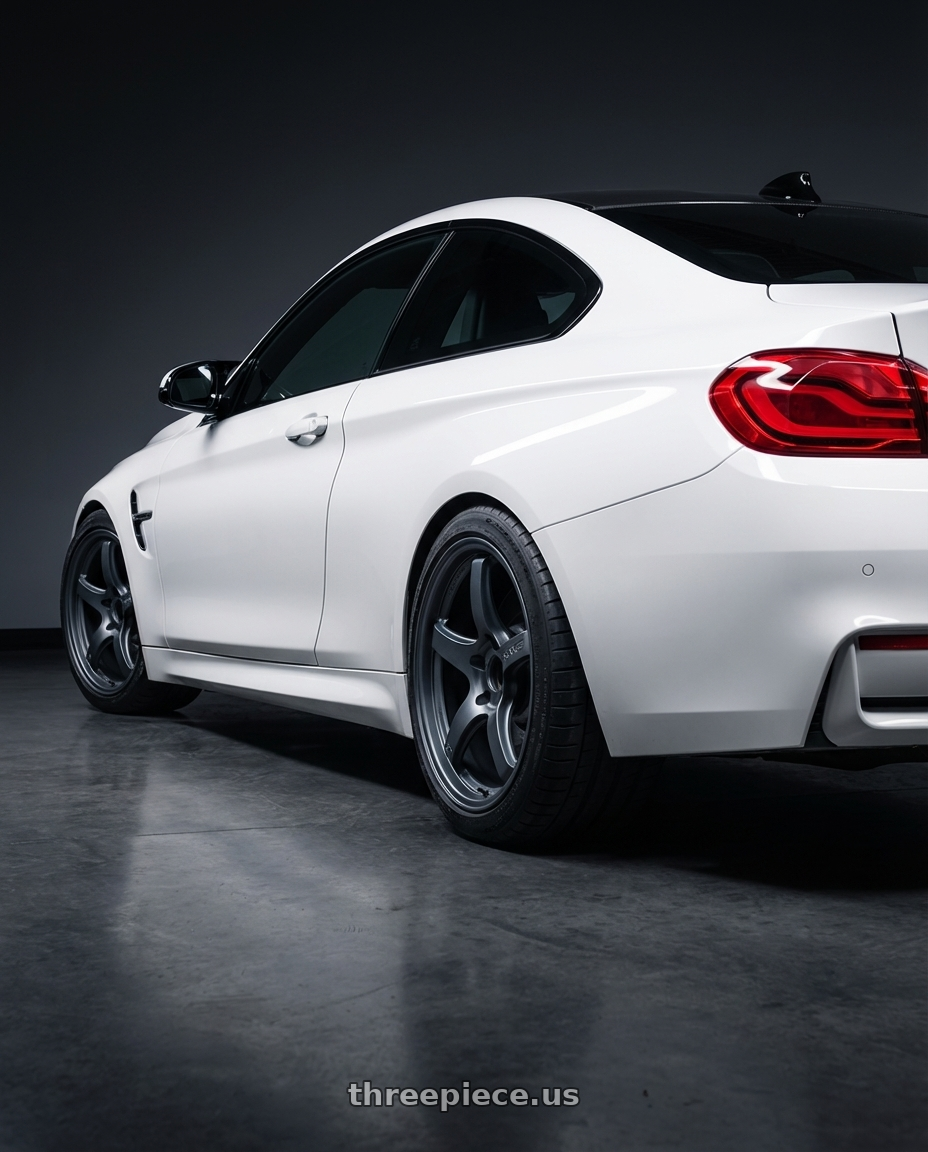 2018 BMW M4 F82 with Gram Lights 57CR 5x120 19x8.5+35 Gunblue II wheels rear three quarter view square tires