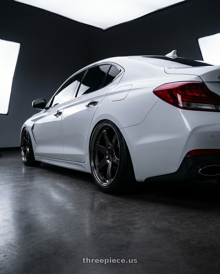 2020 Genesis g70 with Volk Racing TE37SL 5x114.3 19x10.5+12 Pressed Double Black wheels rear three quarter view slight stretch tires