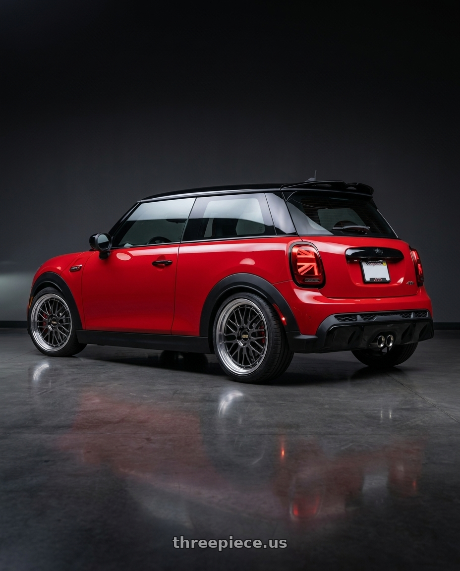 2025 mini jcw red with BBS LM 5x114.3 18x8.5+38 Diamond Black wheels rear three quarter view square tires
