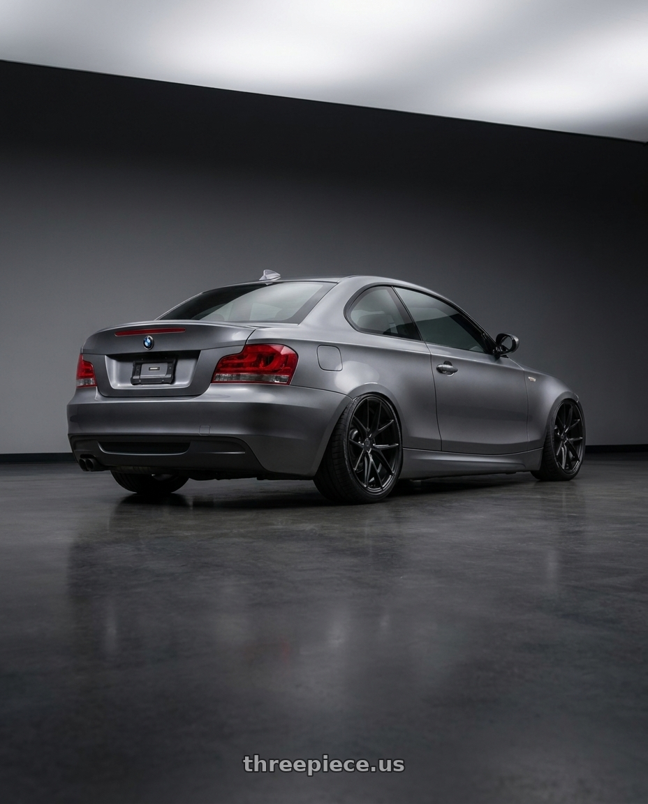 2012 BMW 1 Series E82 with Niche 1PC M117 MISANO 5X120 18X8 +40 MATTE BLACK wheels rear three quarter view slight stretch tires