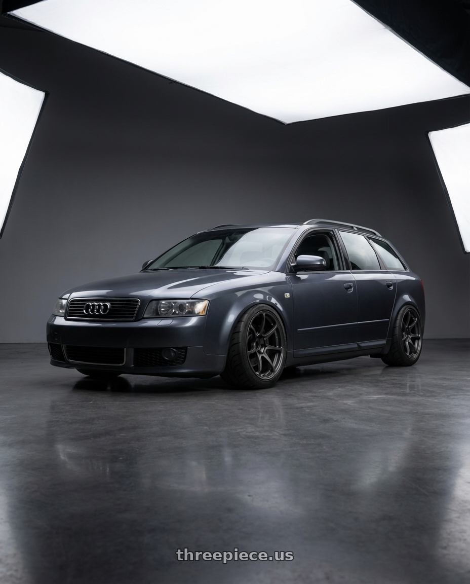 2005 Audi a4 Ultrasport dark grey with Volk Racing NE24 5x120 19x9 +23 MATTE GUNBLACK wheels front three quarter view slammed stance