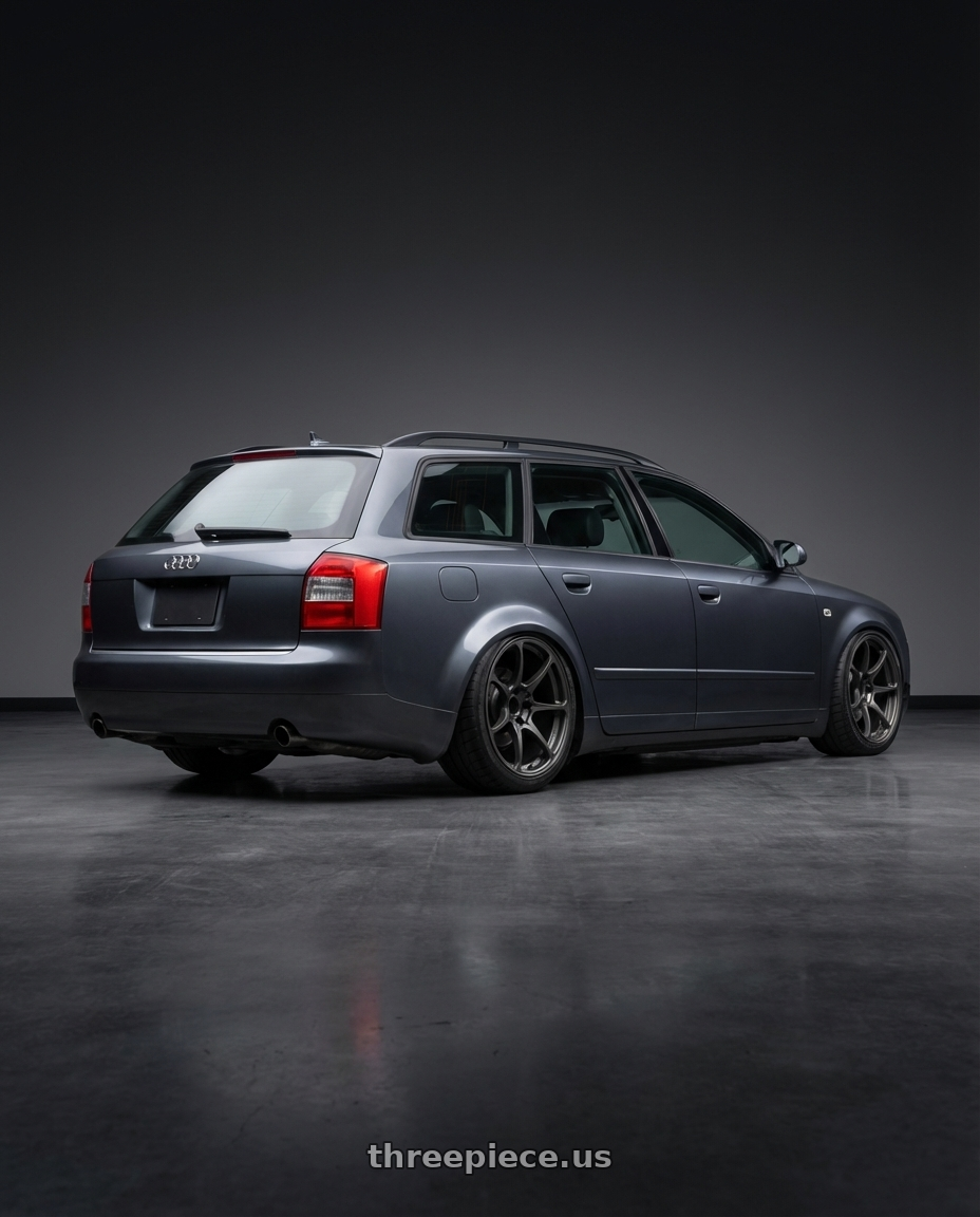 2005 Audi a4 Ultrasport dark grey with Volk Racing NE24 5x120 19x9 +23 MATTE GUNBLACK wheels rear three quarter view meaty tires