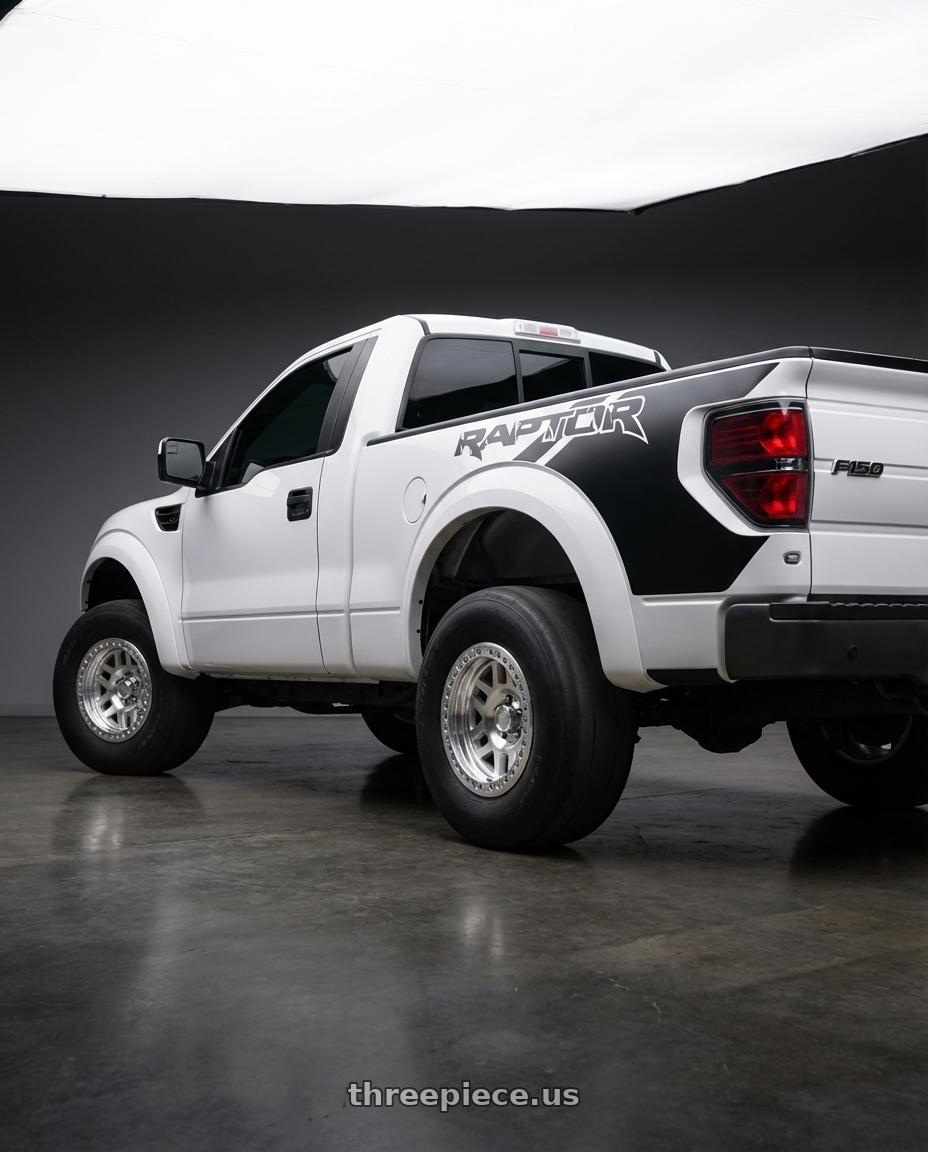 2014 Ford F150 with KMC KM229 MACHETE CRAWL BEADLOCK 6X135 17X9 -38 MACHINED wheels rear three quarter view excessive tires