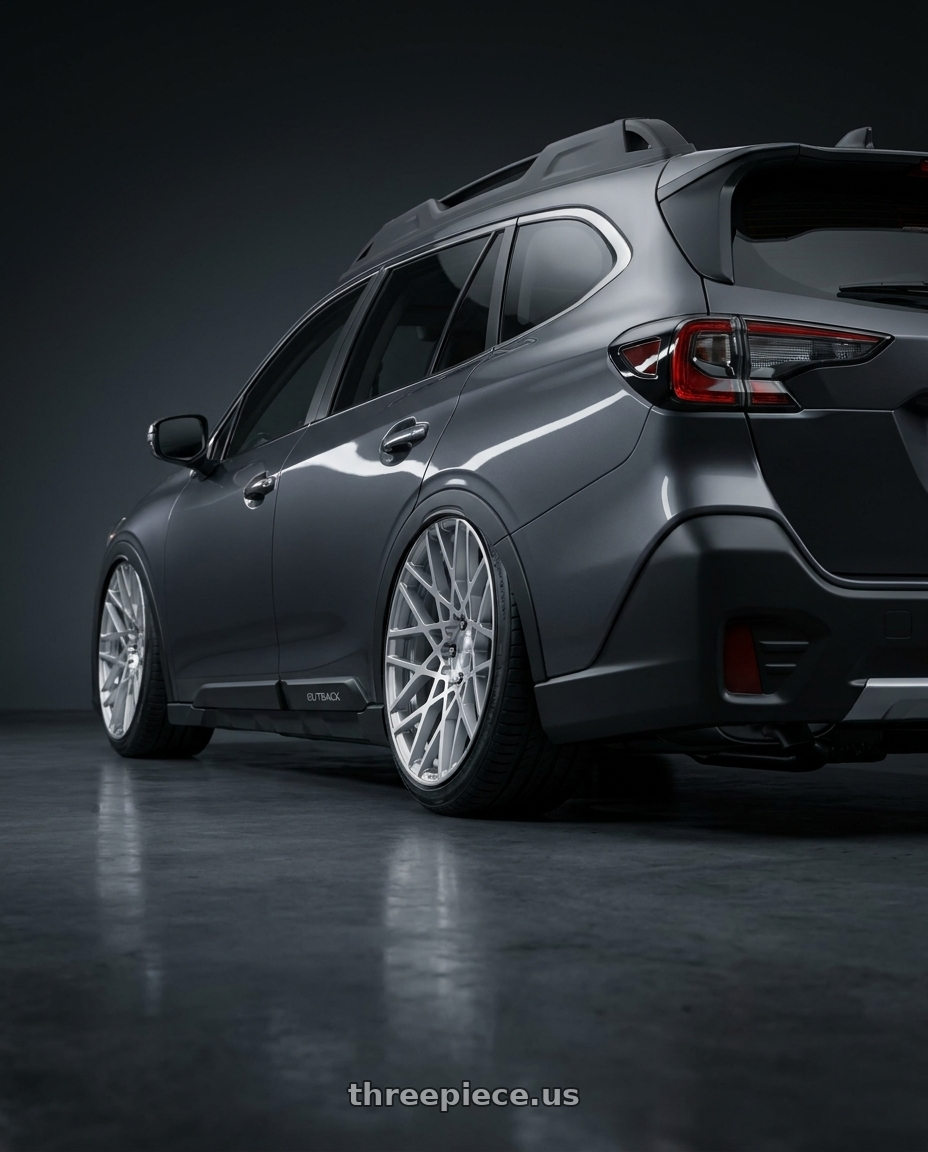 2023 Subaru outback with Rotiform 1PC R110 BLQ 5X112 19X8.5 +35 GLOSS SILVER MACHINED wheels rear three quarter view slight stretch tires