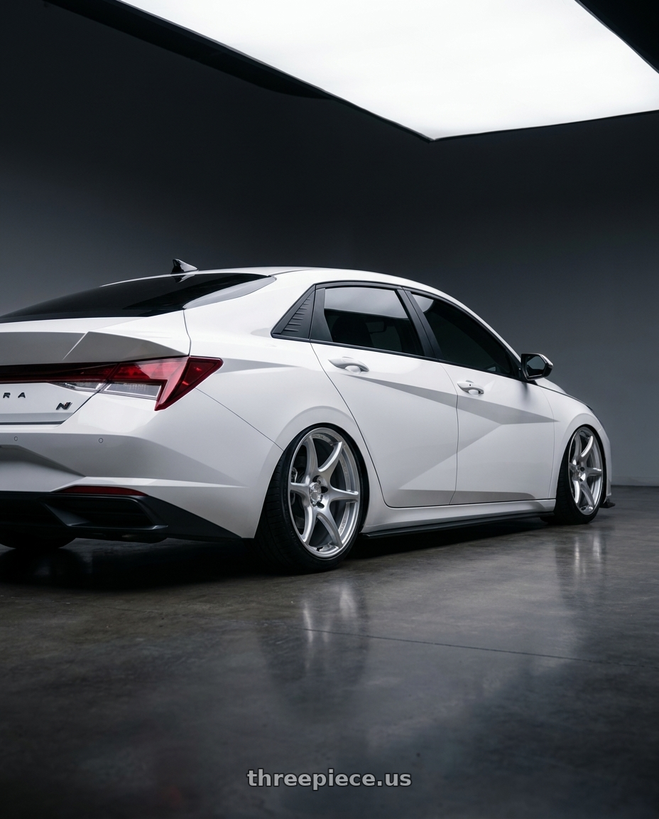 2024 Hyundai Elantra N with Kansei K11S Tandem 5x114.3 19x9.5 12 Hyper Silver wheels rear three quarter view slight stretch tires