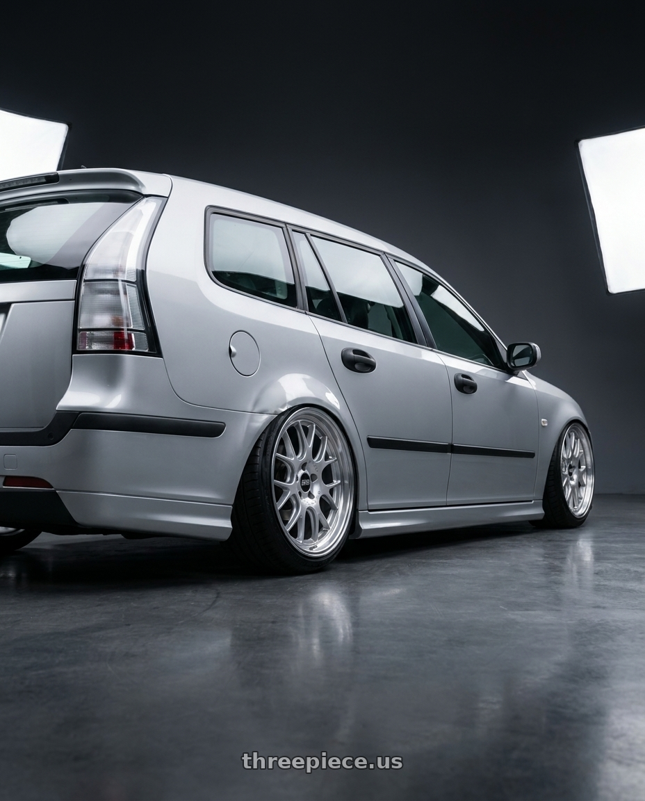 2006 Saab 9-3 Aero SportCombi with BBS CH-R 5x112 18x8.5 +38 Brilliant Silver Polished Rim Protector wheels rear three quarter view extreme stretch tires