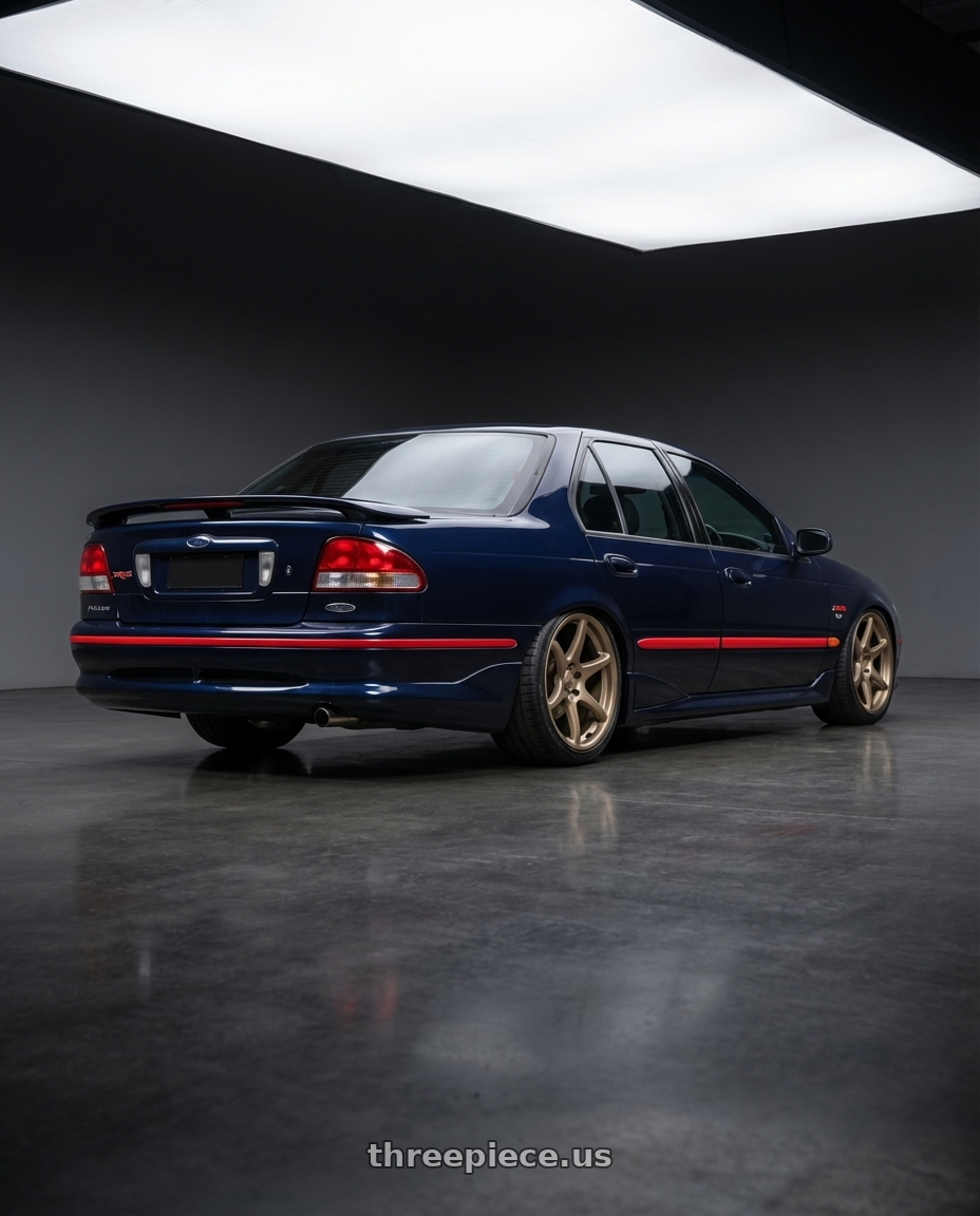 1997 ford falcon xr6 , n9 navy  with Kansei K11B Tandem 5x114.3 19x10.5 12 Bronze wheels rear three quarter view square tires