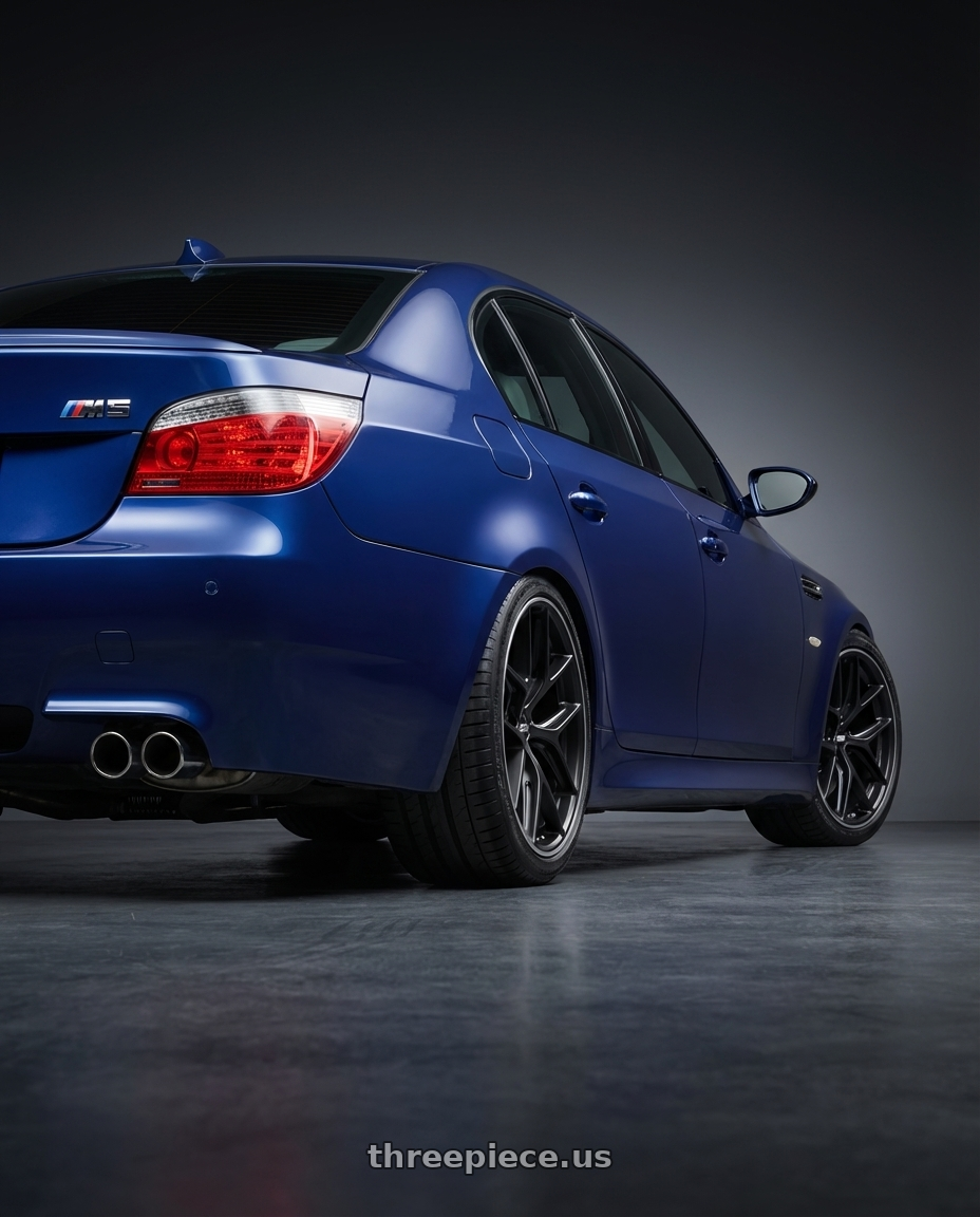 2010 BMW M5 E60 with BBS CC-R 5x120 19x9.0+48 Satin Black wheels rear three quarter view square tires
