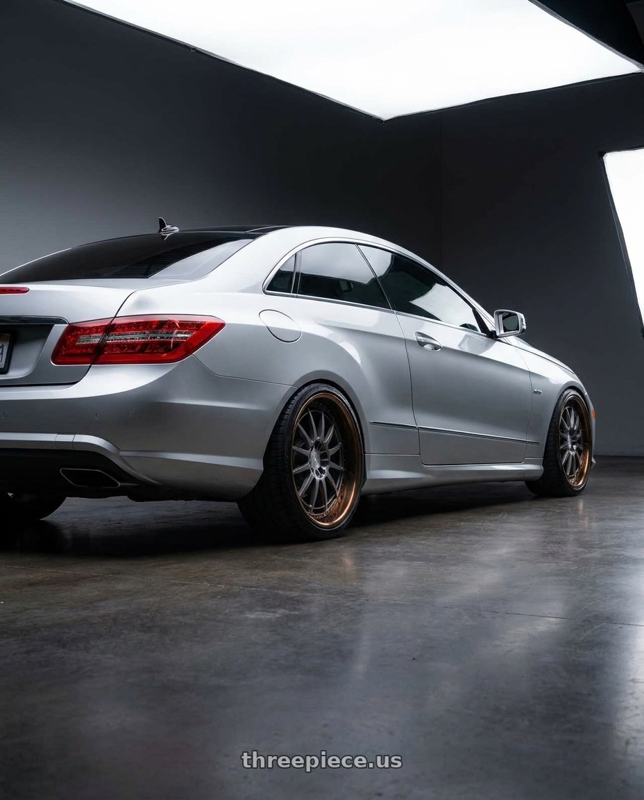 2011 mercedes e coupe irudium sliver with Heritage Wheel HOKKAIDO wheels rear three quarter view square tires