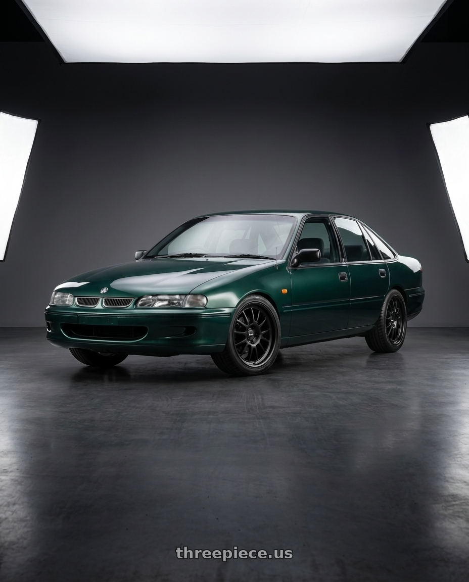 1999 Vs Commodore with Klutch SL14 5x114.3 18x8.5  +35 Matte Black wheels