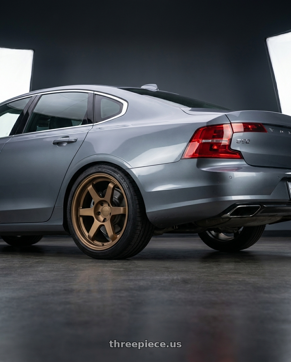 2017 Volvo S90 with 9six9 SIX-1 5x108 18X8.5 +35 Matte Bronze wheels rear three quarter view square tires