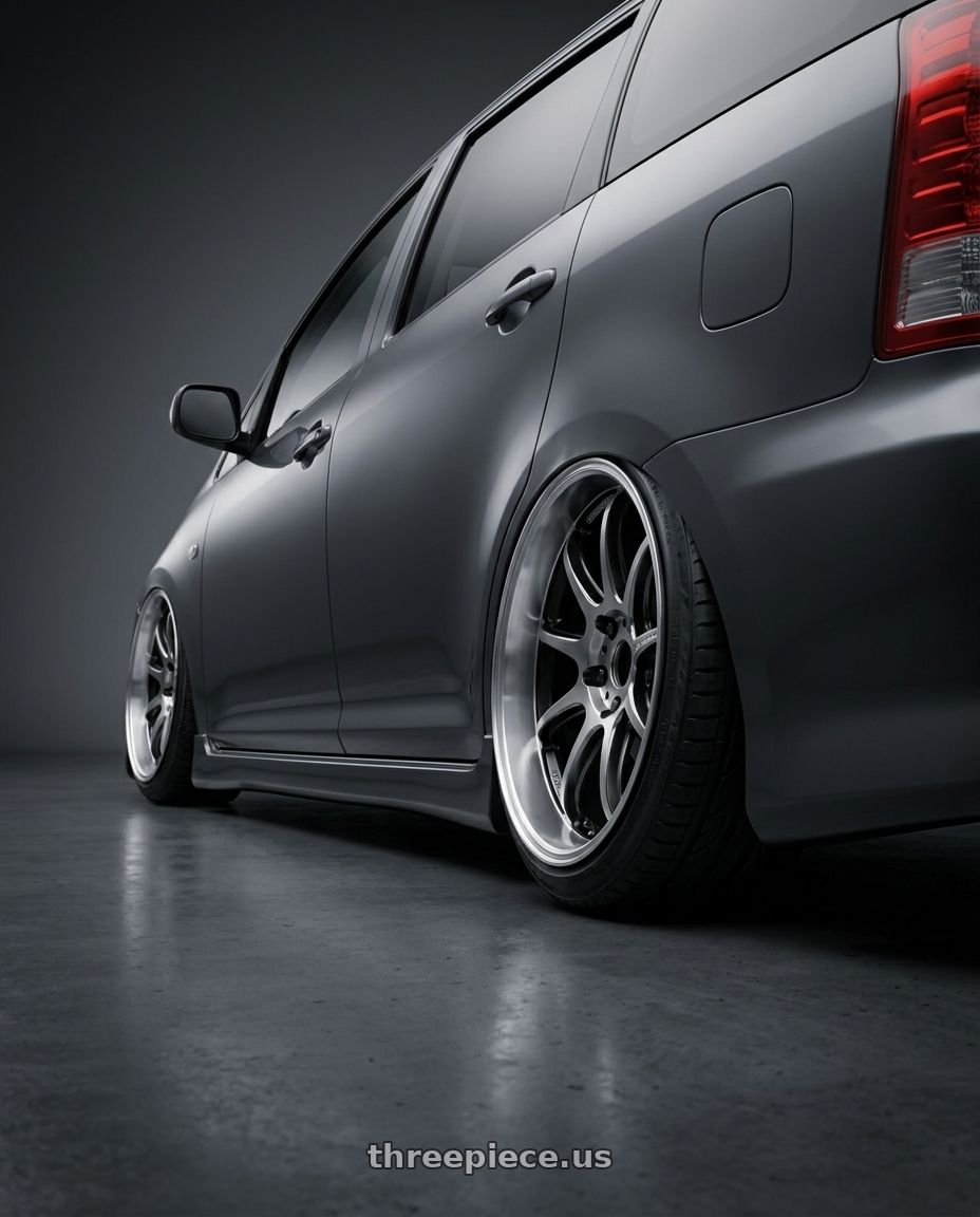 2005 Toyota wish with Work Emotion D9r 5x100 18x8.5 +47 Gt Silver Rim Cut wheels rear three quarter view slight stretch tires