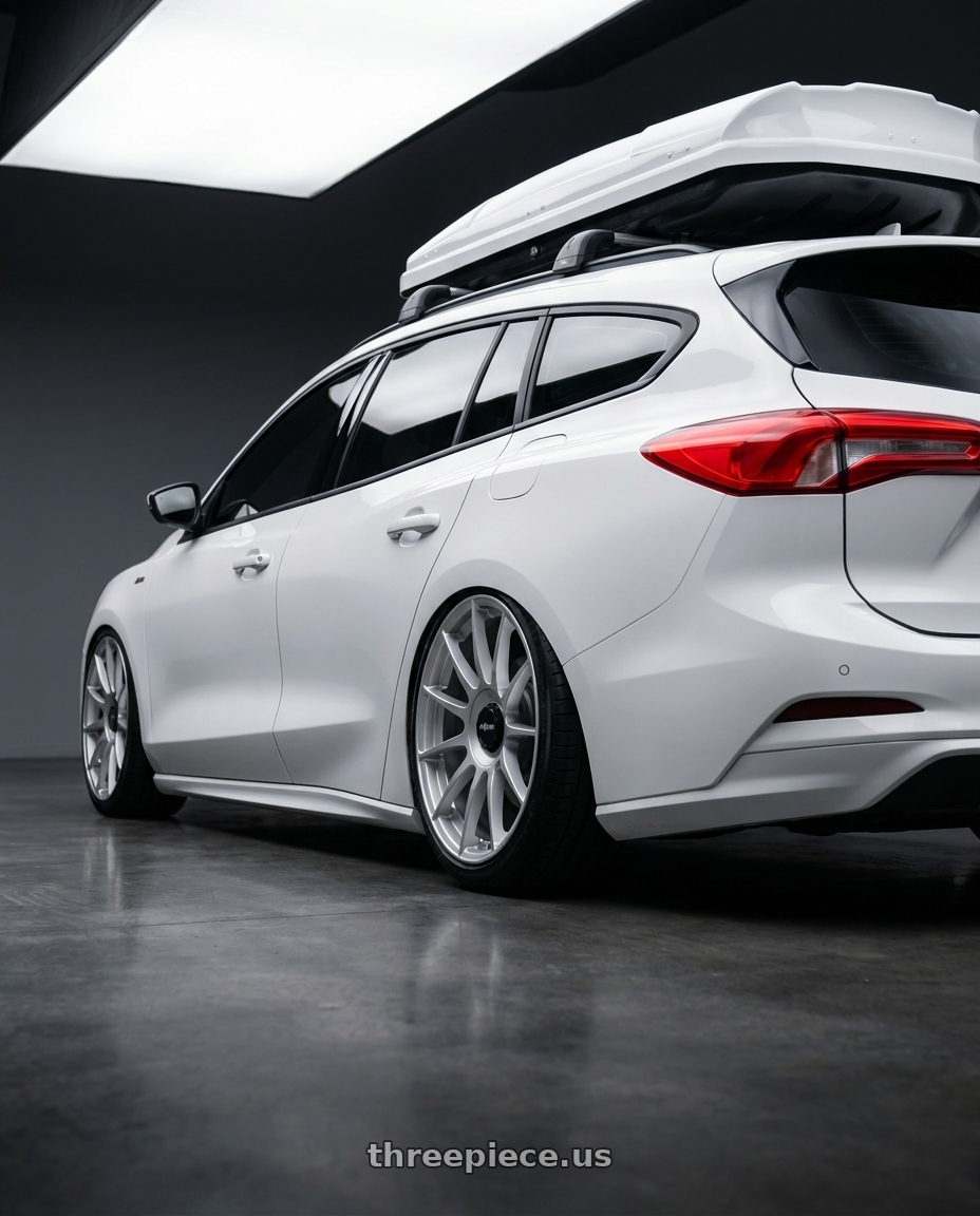 2023 ford focus wagon with Rotiform 1PC R170 DTM 5X108/5X114.3 19X8.5 +45 SILVER wheels rear three quarter view slight stretch tires
