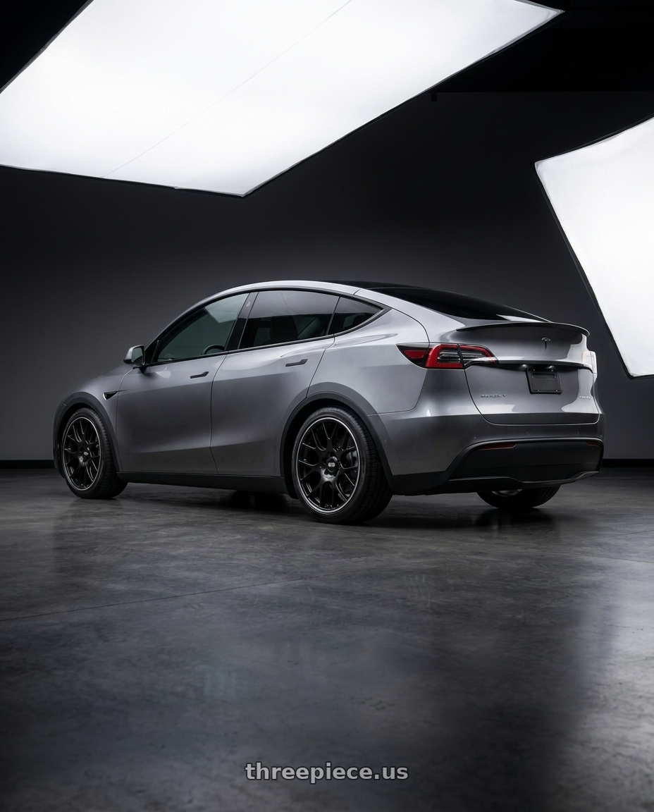 E.g 2026 model y juniper with BBS CH-R 5x130 19x12 +45 Satin Black Polished Rim Protector wheels rear three quarter view square tires