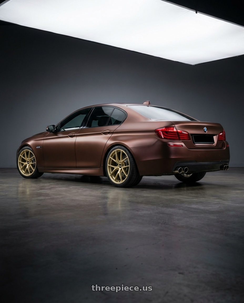 2018 bmw f10 with BBS RI-A 5x130 19x10.5 +43 Gold wheels rear three quarter view square tires