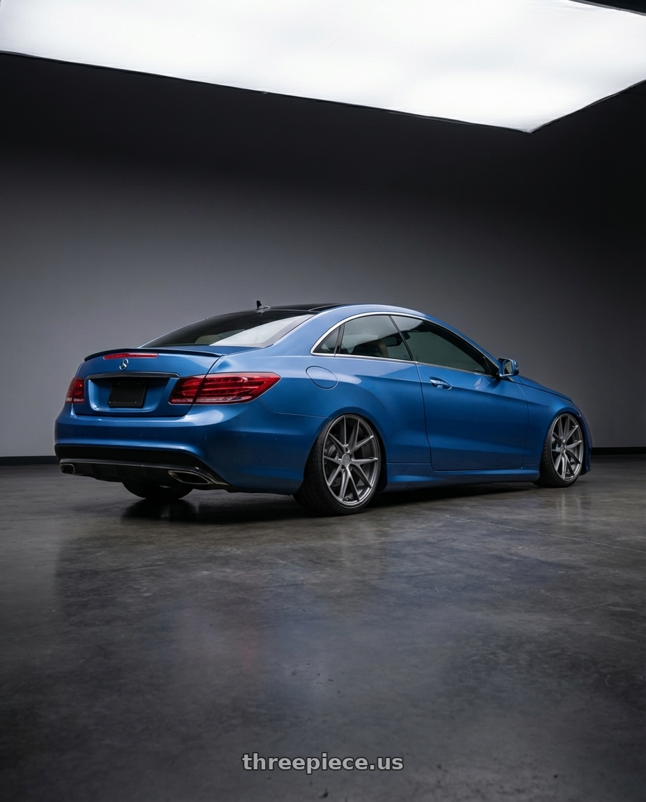 2014 Mercedes-Benz E-Class Coupe C207 with Niche 1PC M116 MISANO 5X112 20X10.5 +27 MATTE GUN METAL wheels rear three quarter view slight stretch tires