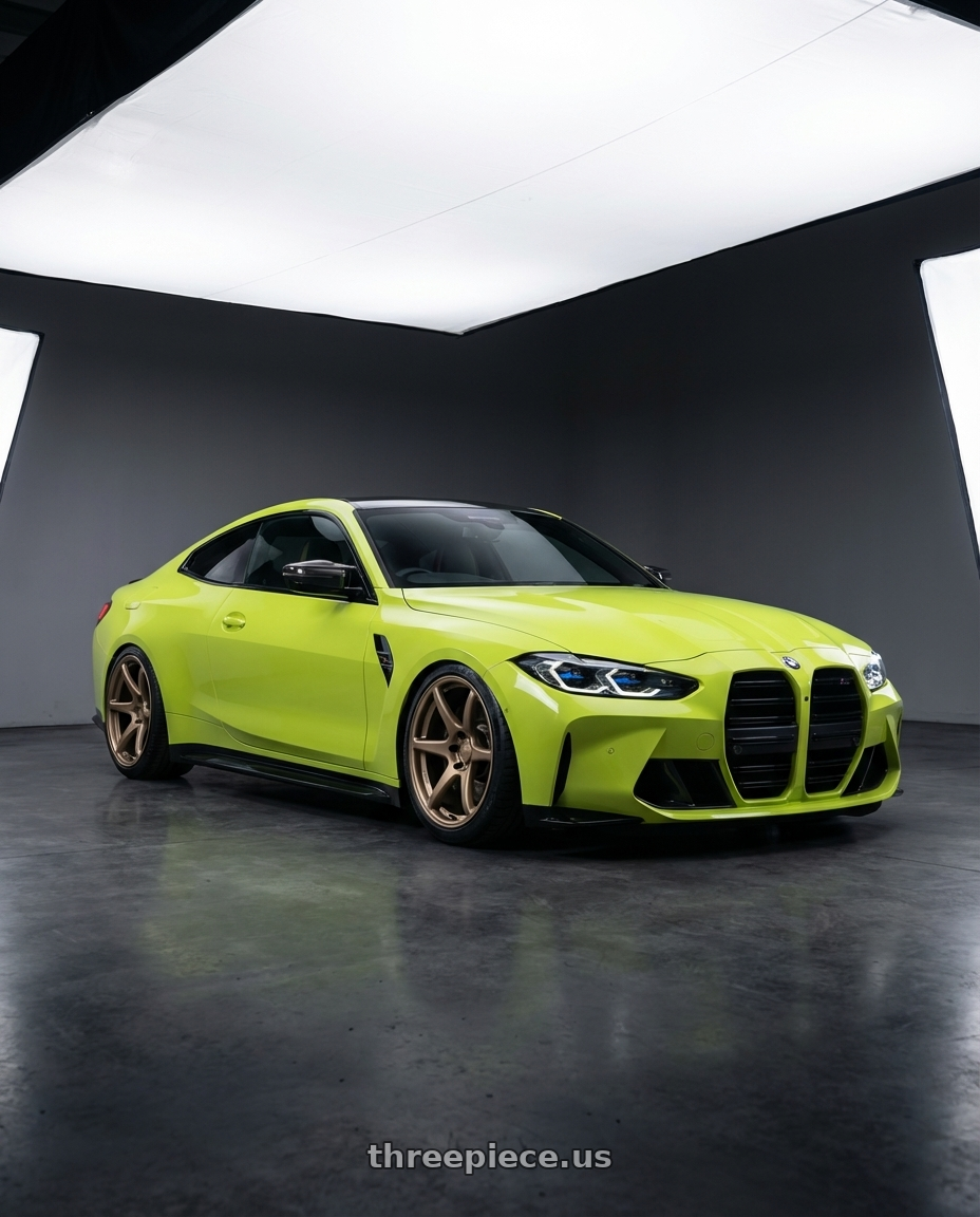 2024 BMW M4 G82 with Kansei K11B Tandem 5X112 19x10.5 22 Bronze wheels front three quarter view stanced stance