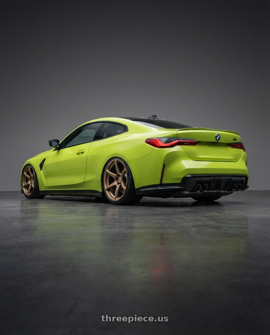 2024 BMW M4 G82 with Kansei K11B Tandem 5X112 19x10.5 22 Bronze wheels rear three quarter view slight stretch tires