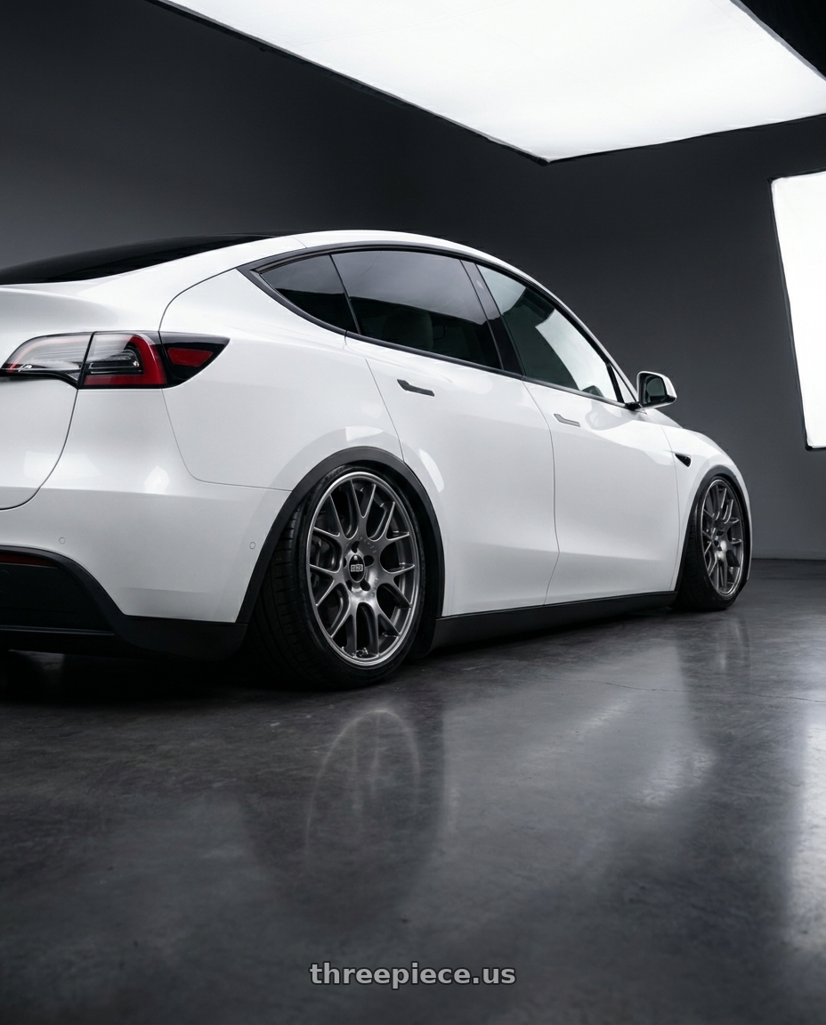 2026 Tesla model y white with BBS CH-R 5x114.3 20x8.5 +38 Satin Titanium Polished Rim Protector wheels rear three quarter view slight stretch tires